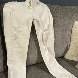 Ripped white stretch jeans